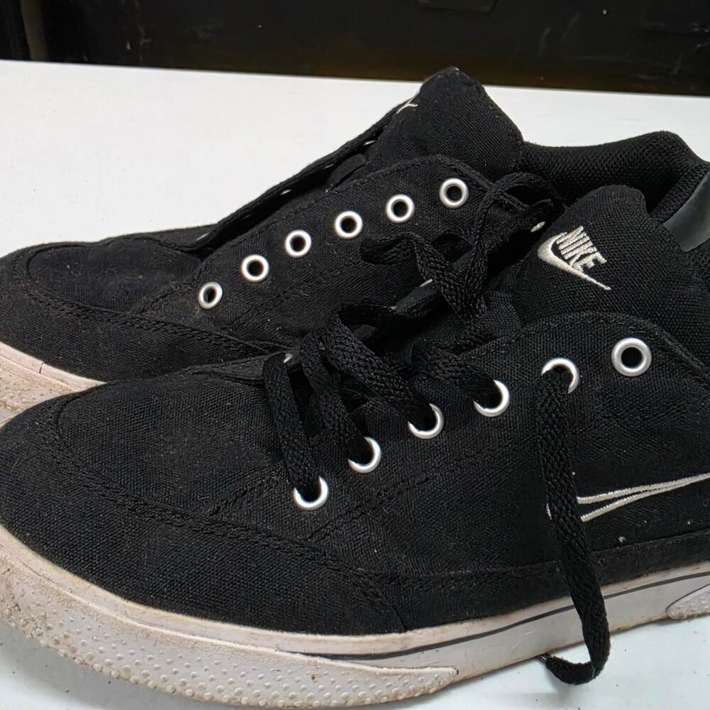 Nike black canvas low top
